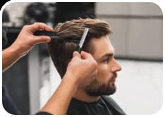 Image of a Man receiving a haircut